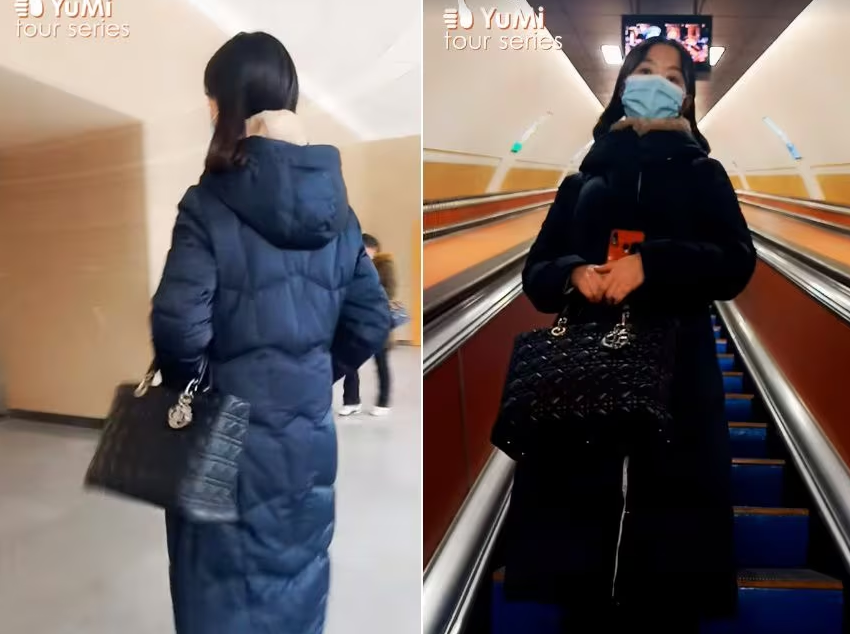 디올의 레이디백으로 추정되는 가방을 들고 북한 지하철을 소개하고 있는 유미. /올리비아 나타샤 유튜브